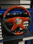 Raptor 15" Black Leather Wood Steering Wheel. Fixed Price $139.50.